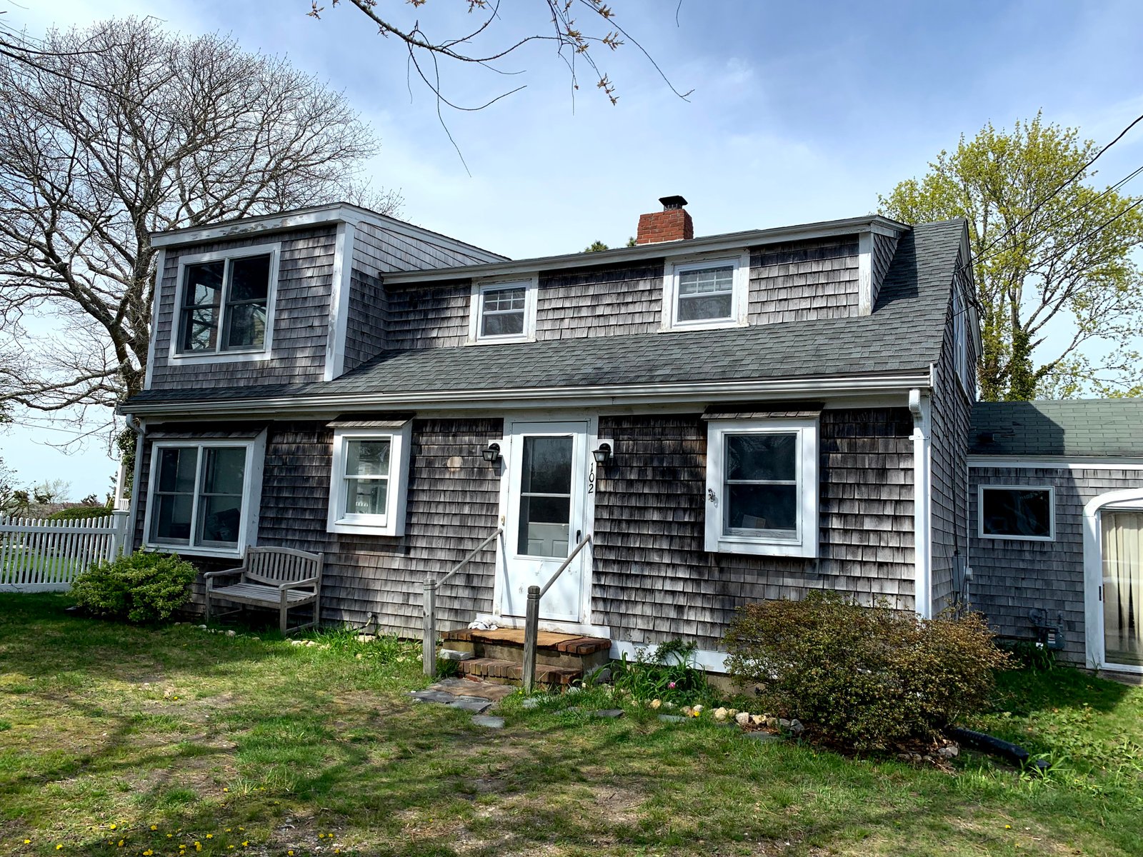 After: Pocasset Waterfront Home: Cedar Siding & Trim Restoration